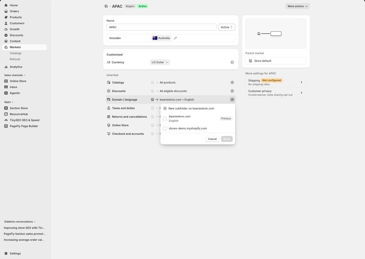 Domain and language customization inside a Shopify market, offering a new subfolder on the primary domain, the primary domain with English, and the myshopify.com domain